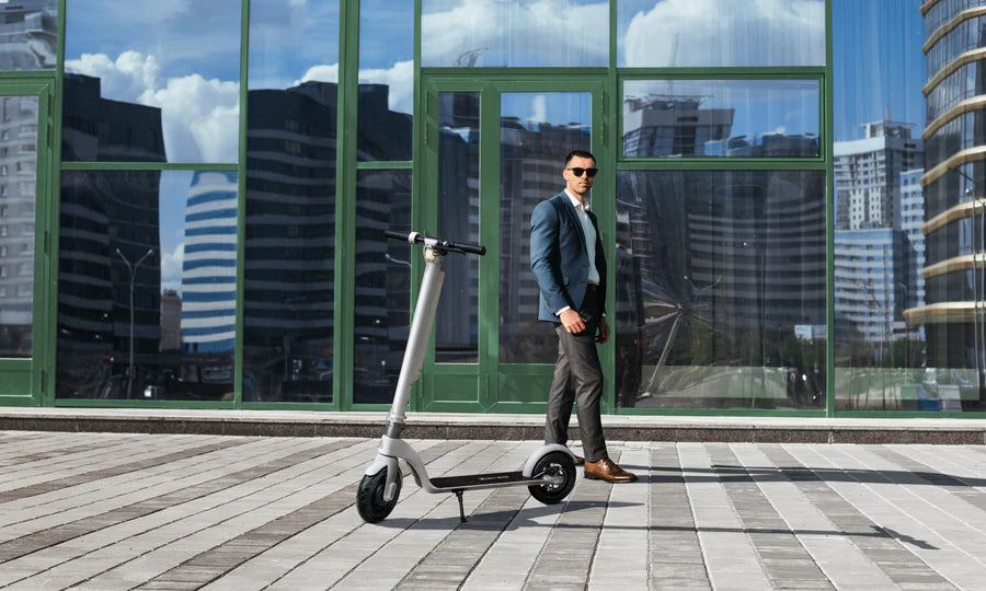 metro america electric scooter in front of a modern building